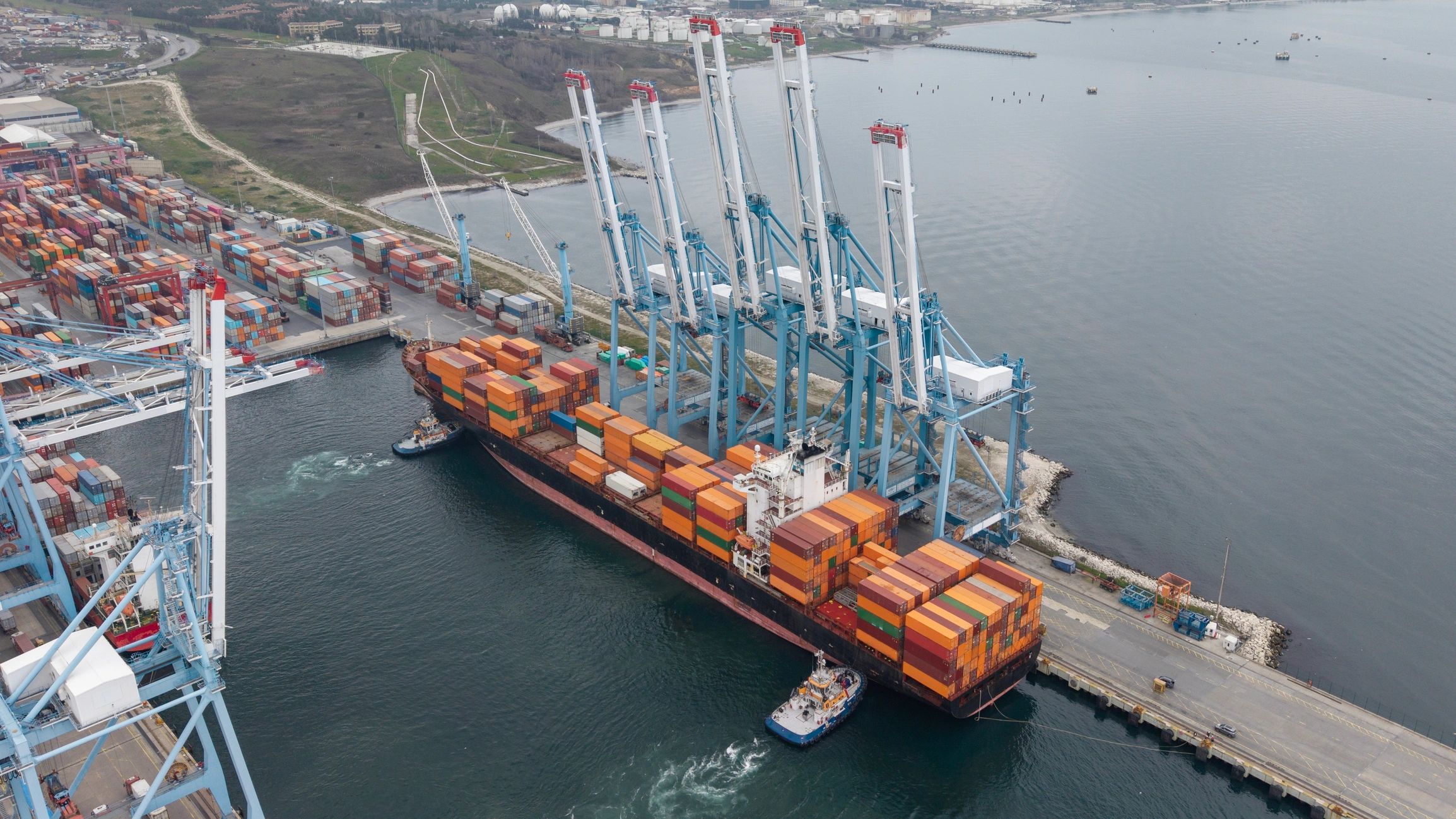 Shipping containers and cargo operations at a commercial port
